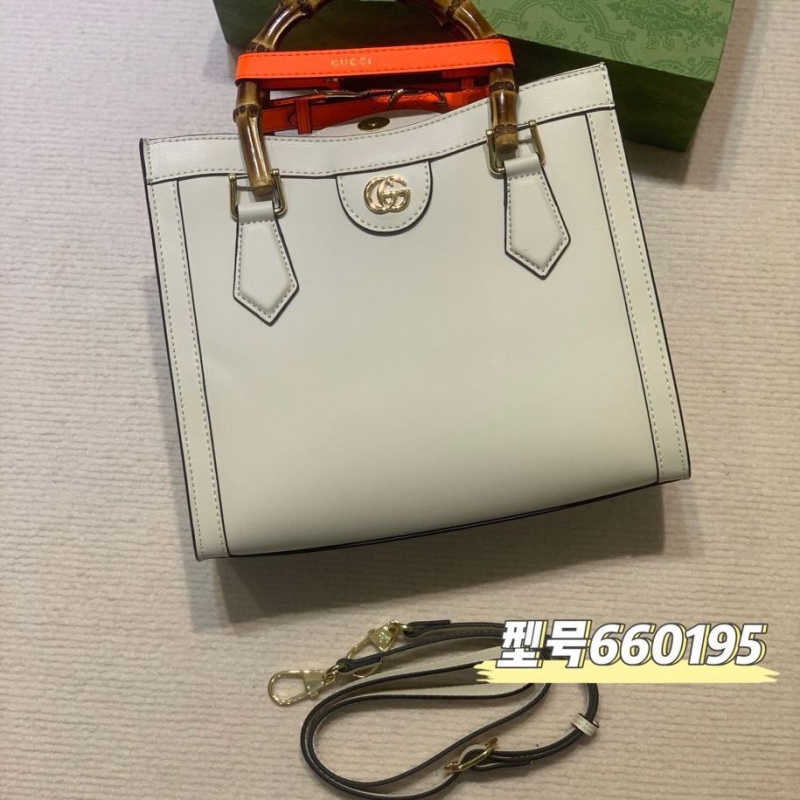 G*u*i top handle bags